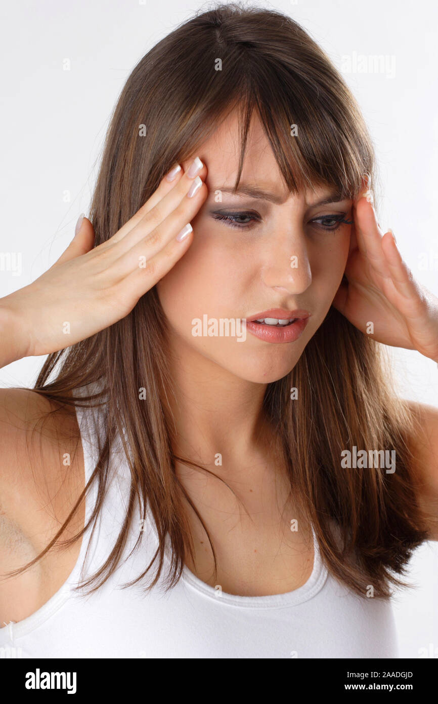 Junge Frau hat Kopfschmerzen Foto Stock
