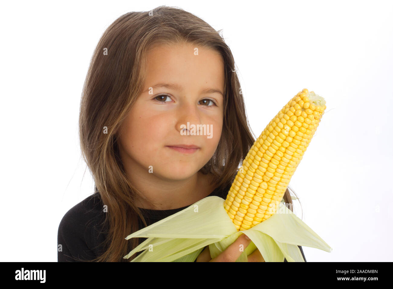 Mädchen mit Maiskolben (MR) Foto Stock