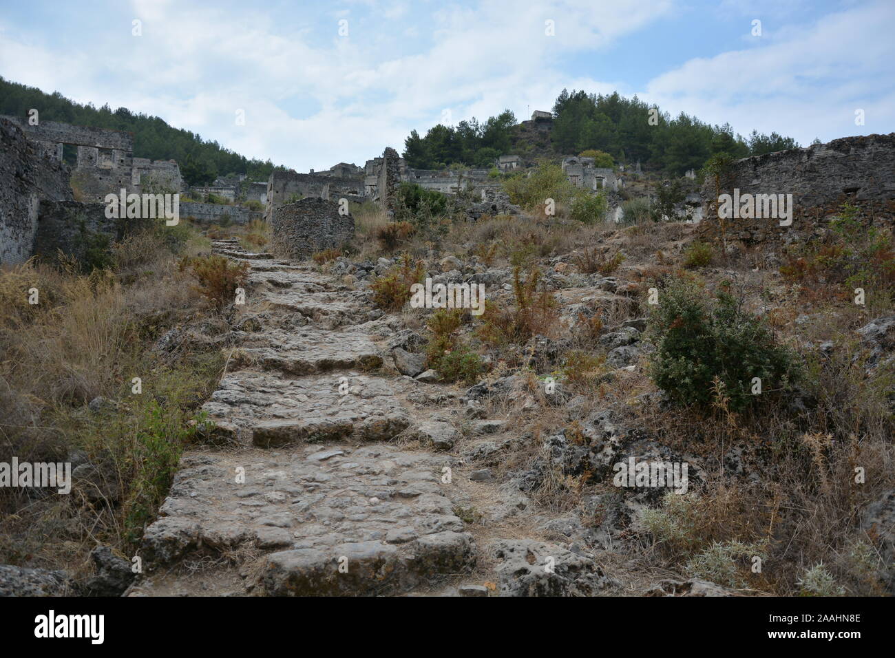 MUGLA, Turchia - 29 agosto 2018: Rovine di Kayakoy villaggio nel distretto di Fethiye Foto Stock
