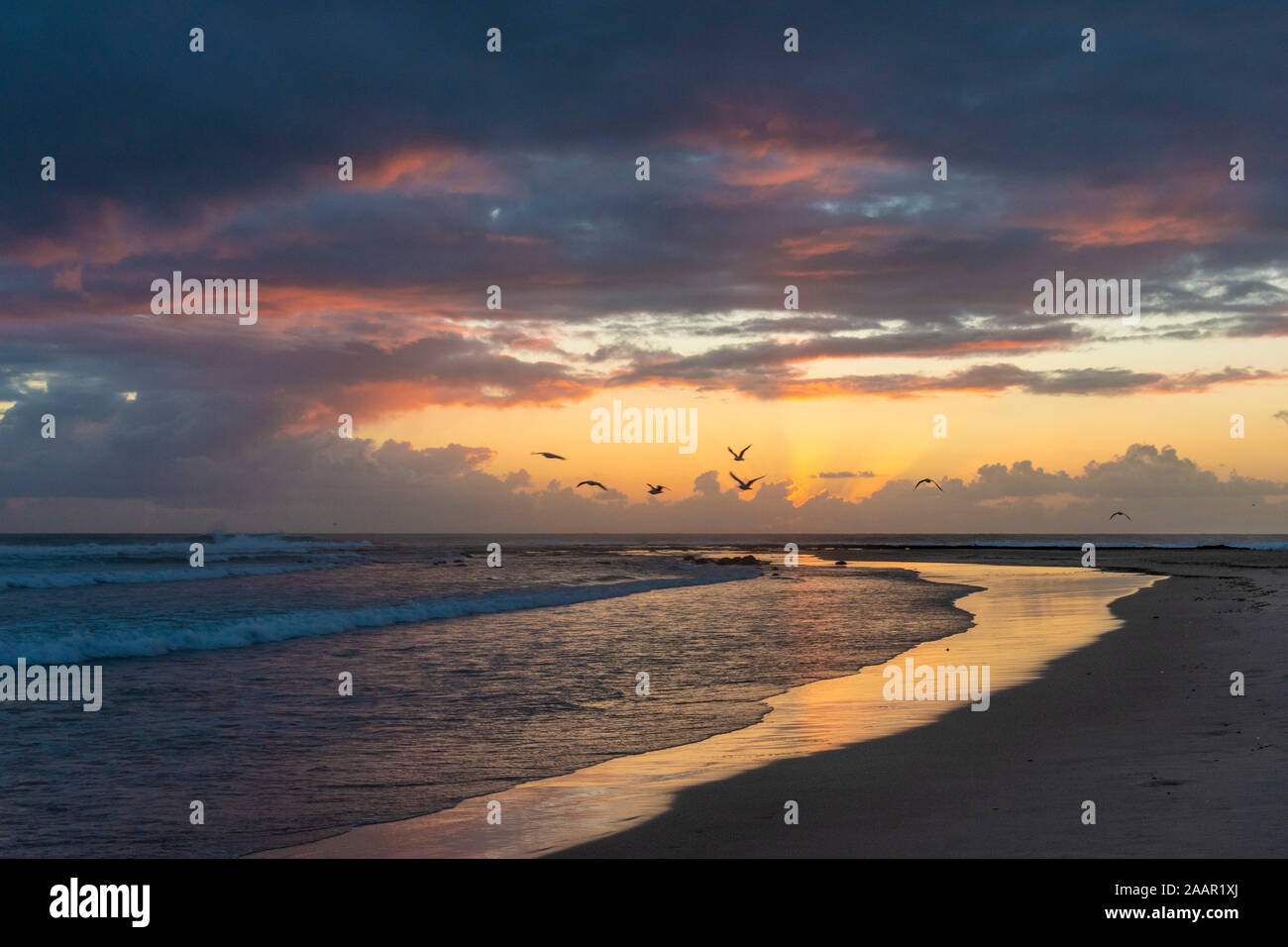 Tramonto a Flat Rock Beach Foto Stock