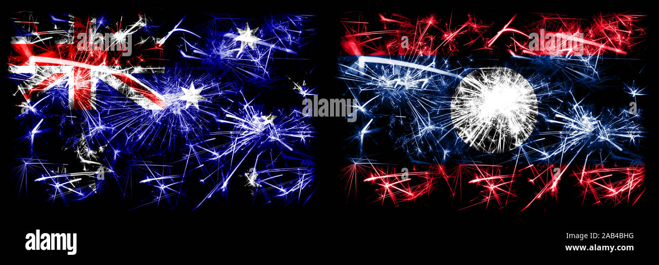 Australia, Ozzie vs Laos Anno Nuovo celebration Sparkling fuochi d'artificio concetto flag di sfondo. Combinazione di due stati astratta bandiere. Foto Stock