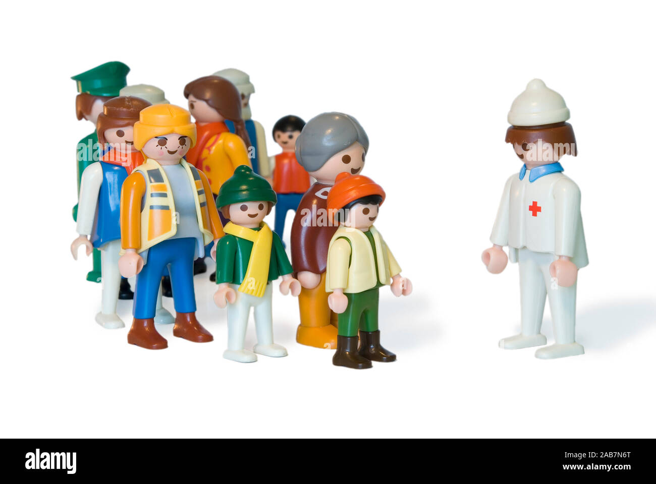 Playmobil figure che rappresentano una linea presso il medico office Foto Stock