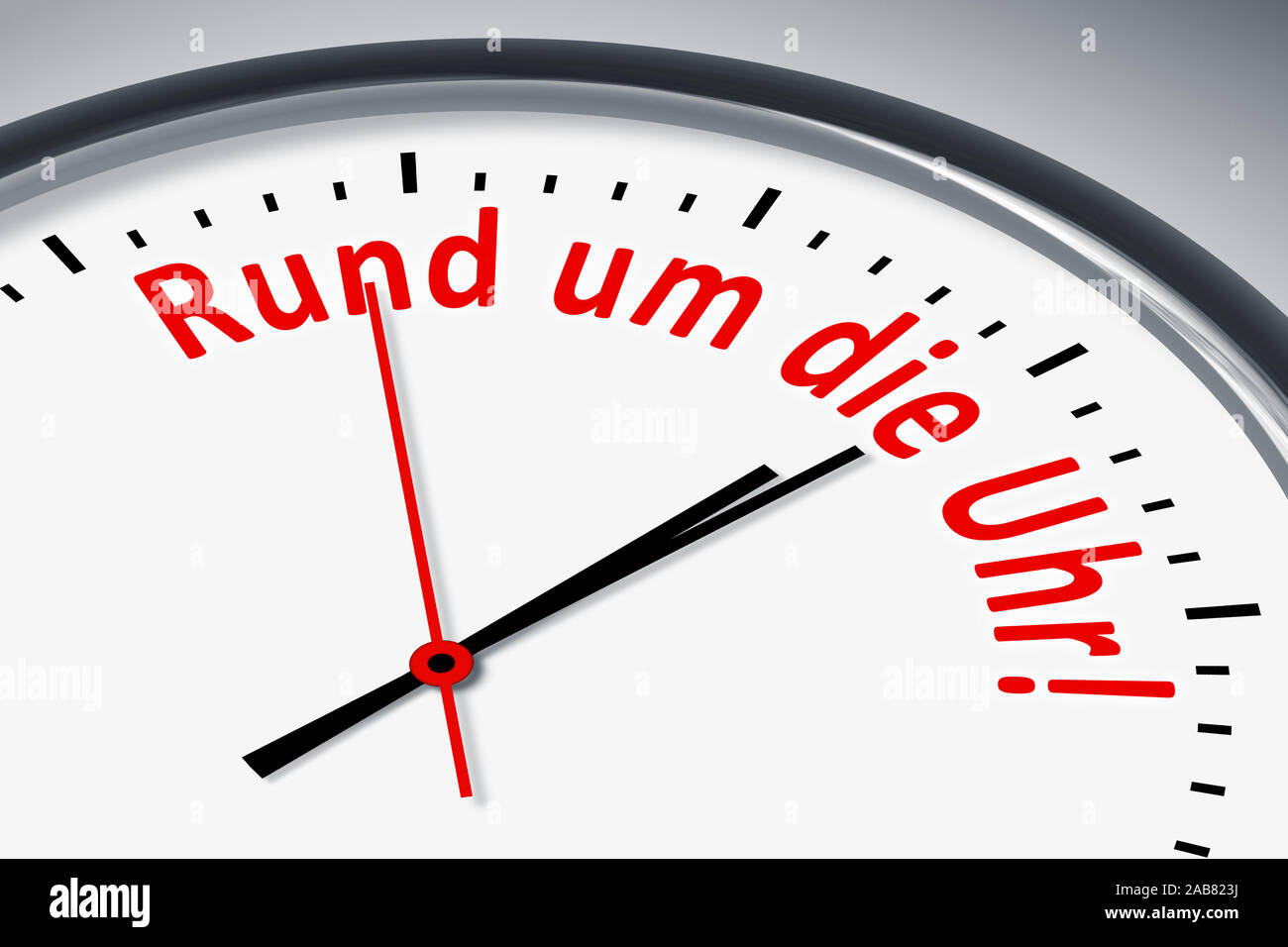 Ein simples Ziffernblatt mit der Aufschrift: "rund um die Uhr!' Foto Stock