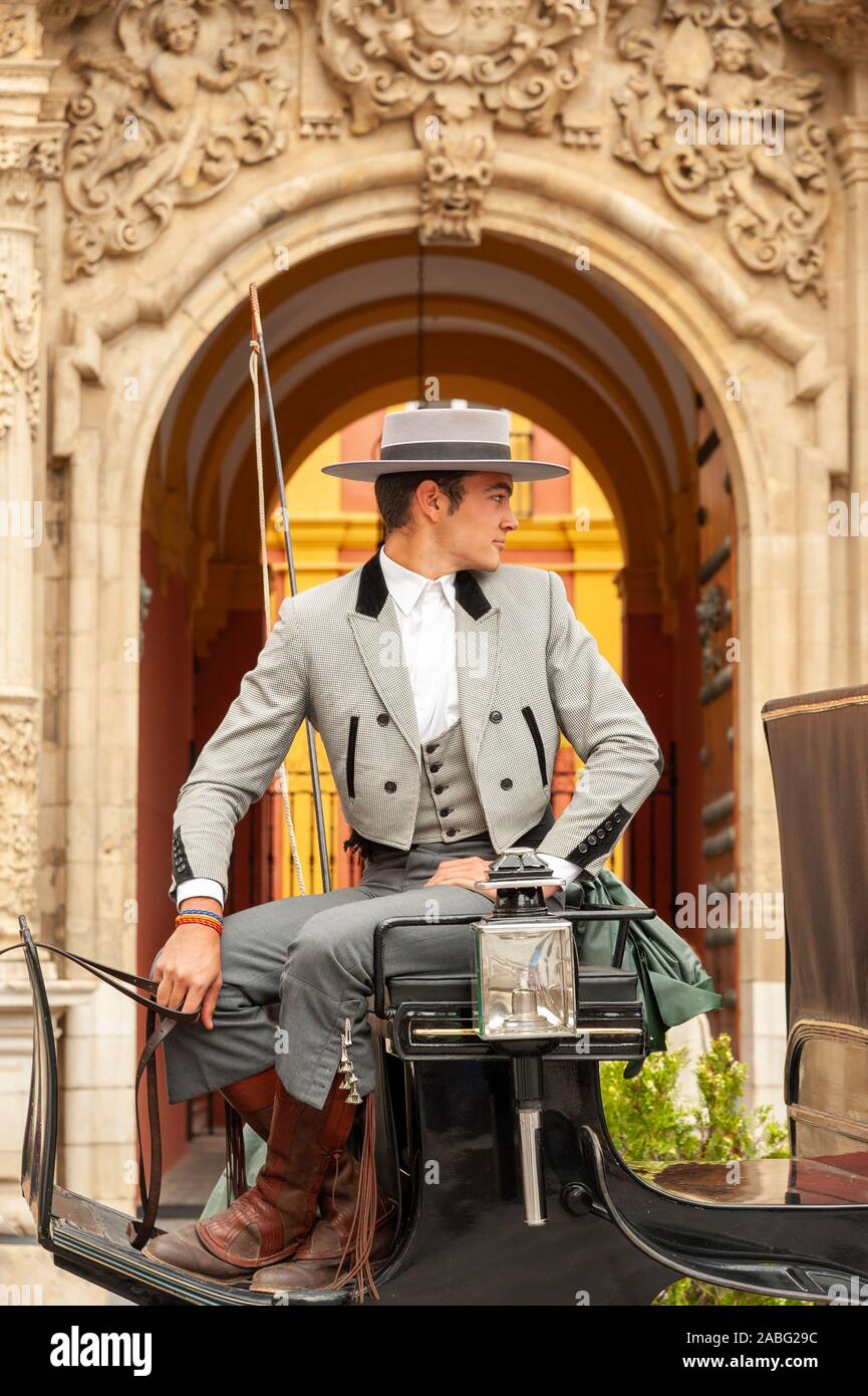 Cavallo e Carrozza driver, Siviglia, Spagna Foto Stock