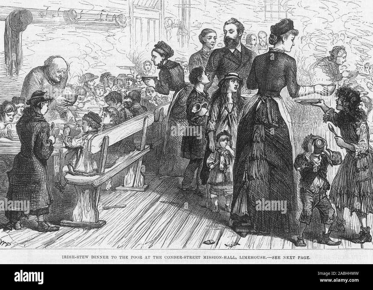 La povertà di Londra 1881. Serve un Irish cucire la cena al Conder Street Mission Hall di Limehouse,Londra. Foto Stock