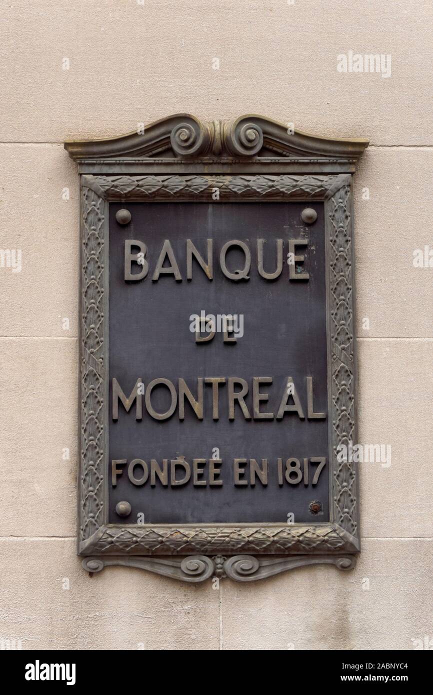 Vecchia Banca di Montreal o la Banque de Montreal la placca metallica sulla parete di un edificio nel centro di Montreal, Quebec, Canada Foto Stock