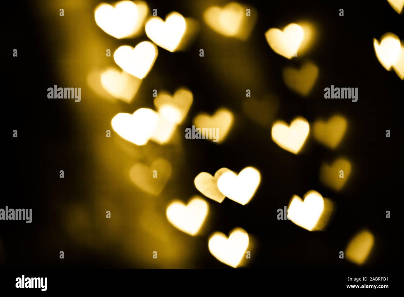 Festosa effetto di sovrapposizione. Cuore d'oro bokeh festosa glitter sfondo. Natale, Capodanno e San Valentino design Foto Stock