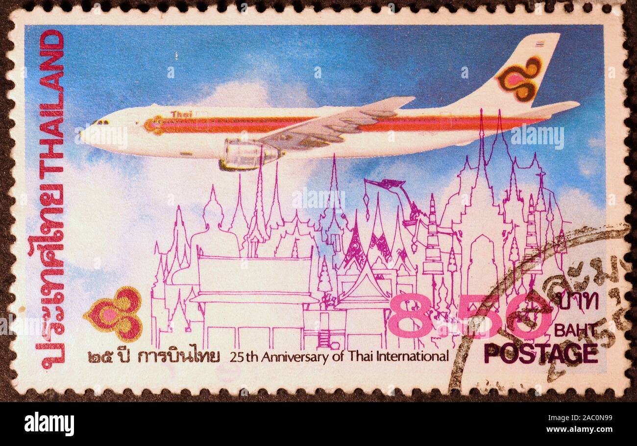 Gli aeromobili della Compagnia Aerea tailandese sul francobollo Foto Stock