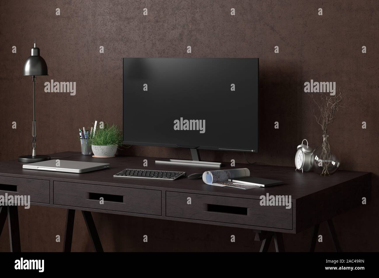 Scrivania con monitor per computer. Posto di lavoro in studio o a casa con parete marrone. Tracciato di ritaglio intorno alla visualizzazione Foto Stock