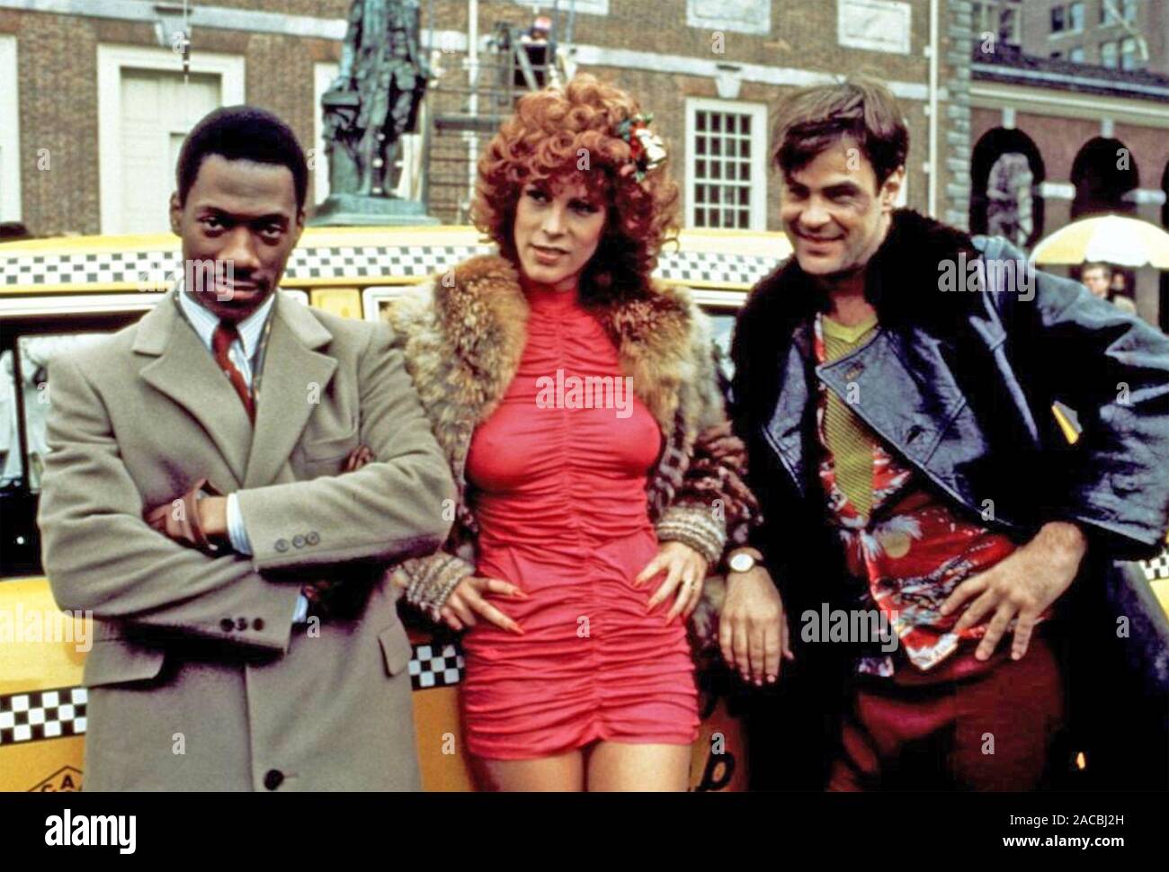 TRADING PLACES 1983 Paramount Pictures film commedia con da sinistra: Eddie Murphy, Jamie Lee Curtis, Damn Aykroyd Foto Stock