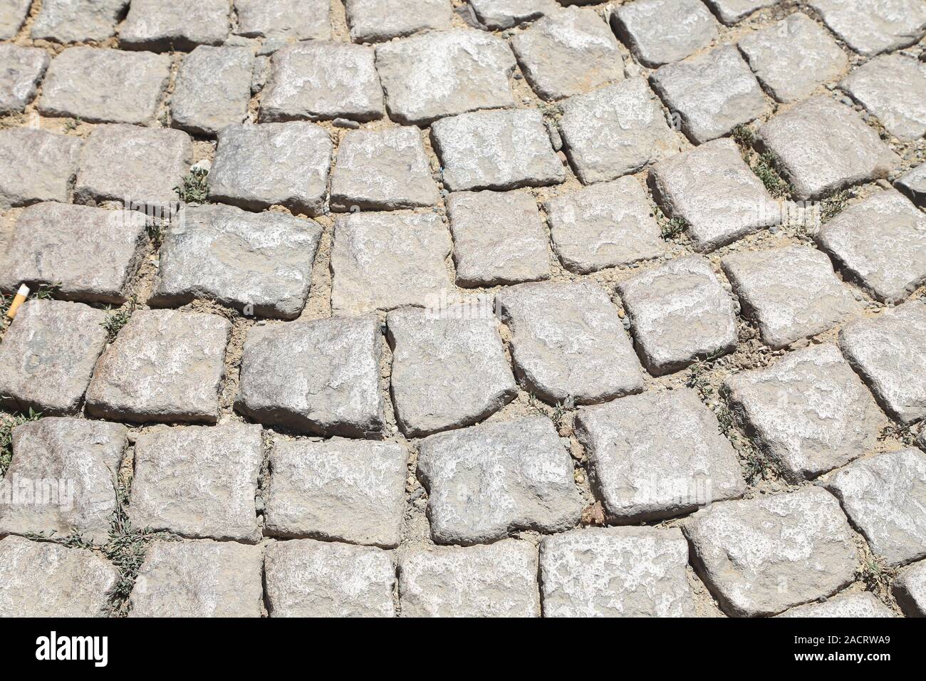 Stone Road texture. Acciottolato. Close-up. Foto Stock