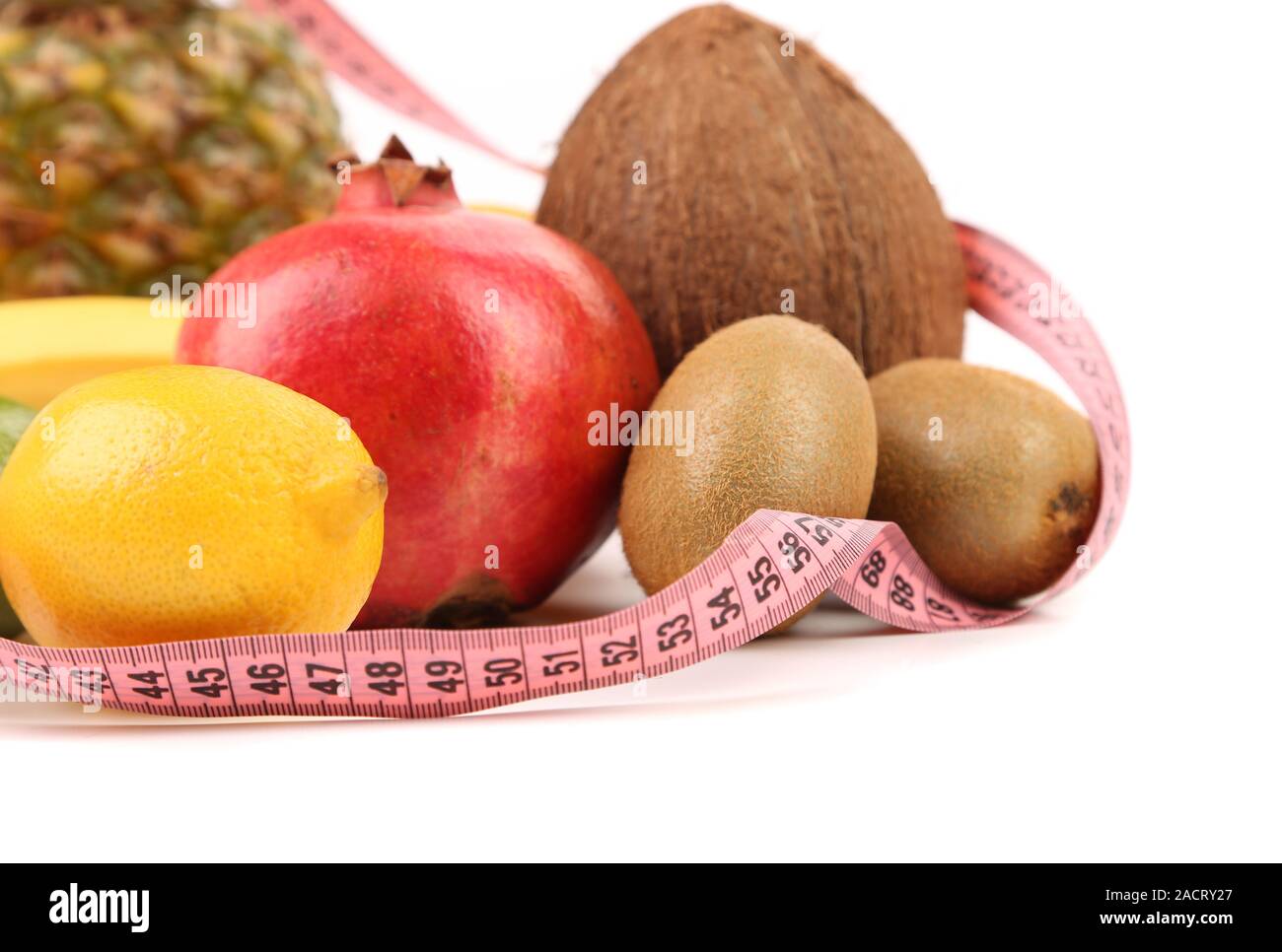 Metro a nastro e composizione di frutta Foto Stock