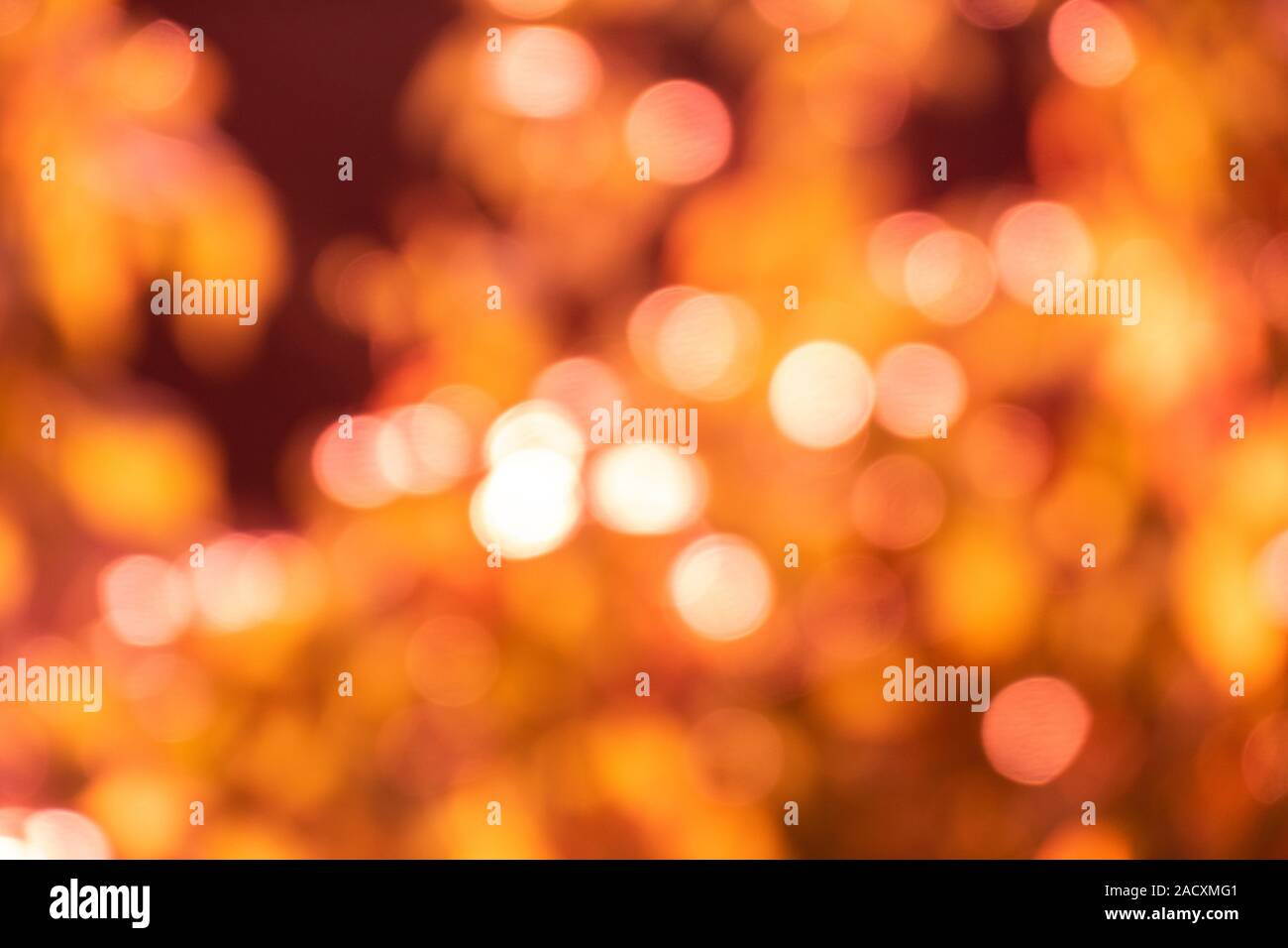 Colorato sun spot sfondo bokeh - arancione Foto Stock