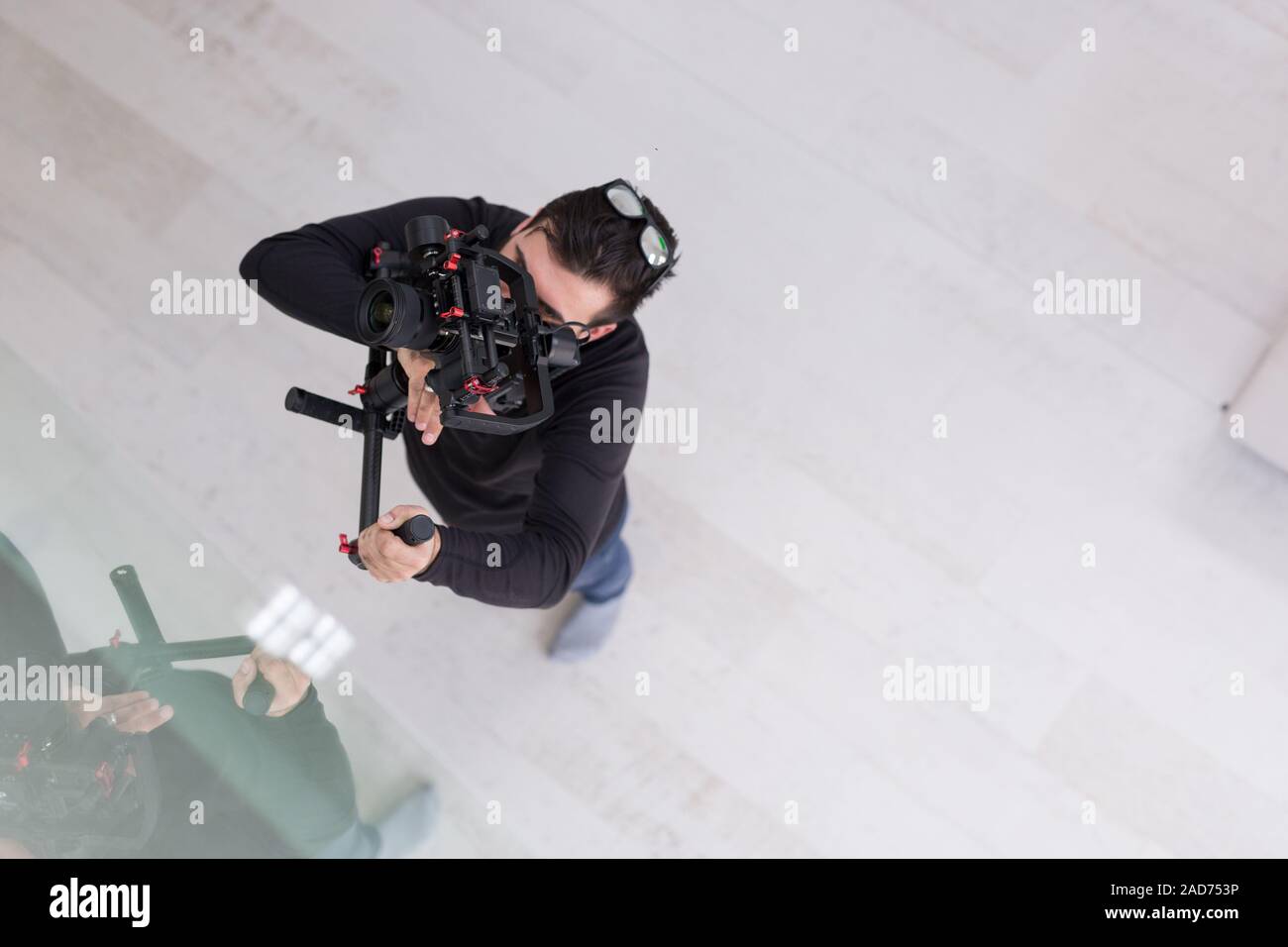 Videografo al lavoro Foto Stock