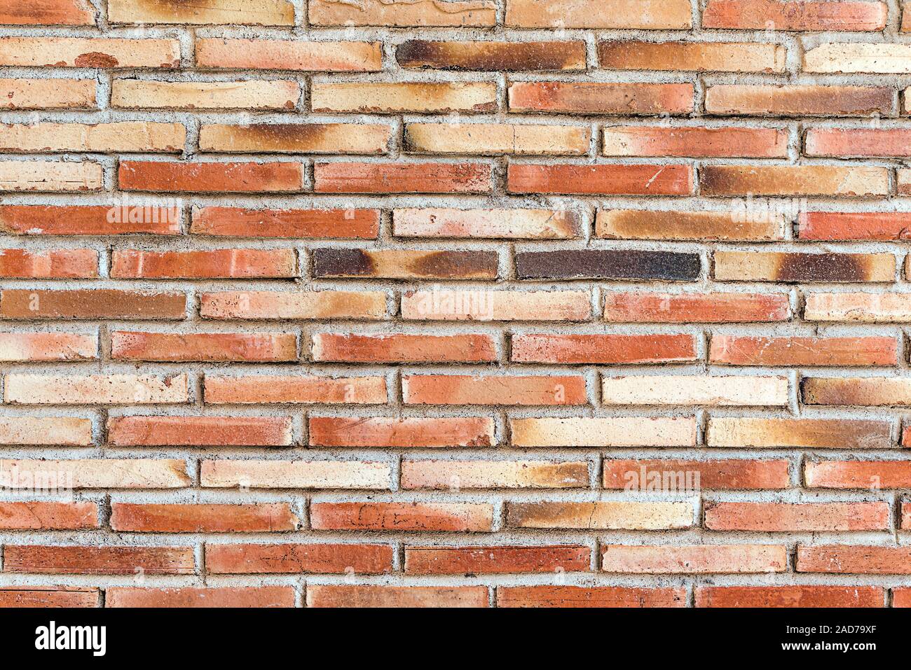 Sfondo di un vecchio e robusto brickwall rosso Foto Stock