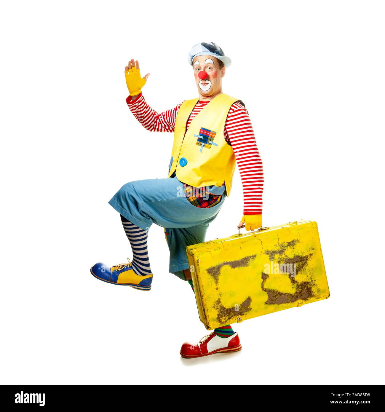 Un divertente clown con sorridente espressione gioiosa Foto Stock