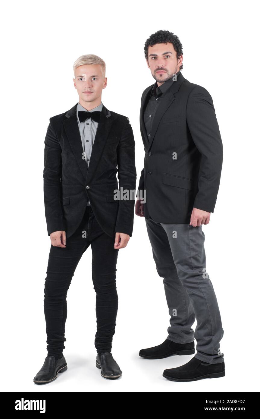 Due giovani uomini in giacche isolato su bianco Foto Stock