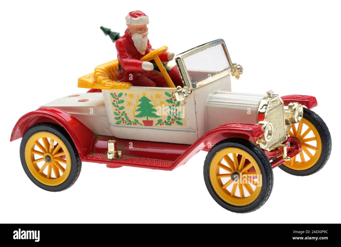 Babbo Natale in un vecchio Ford Motor Car. Dinky metallo pressofuso giocattolo con Santa e un albero di Natale. Foto Stock