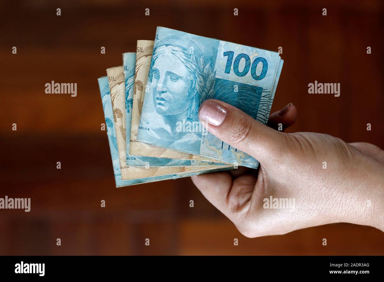 Mani real brasiliano note, soldi dal Brasile, note di Real, Brasile BRL banconota, valuta brasiliana, di economia e affari. Foto Stock