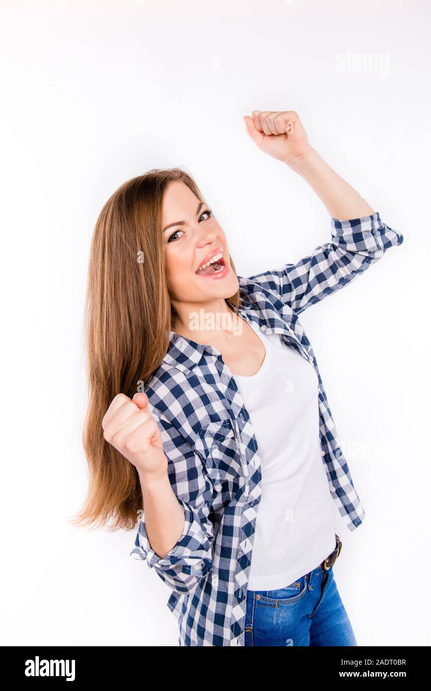 Successo di raggiungere l'obiettivo. Felice ragazza gesti Foto Stock