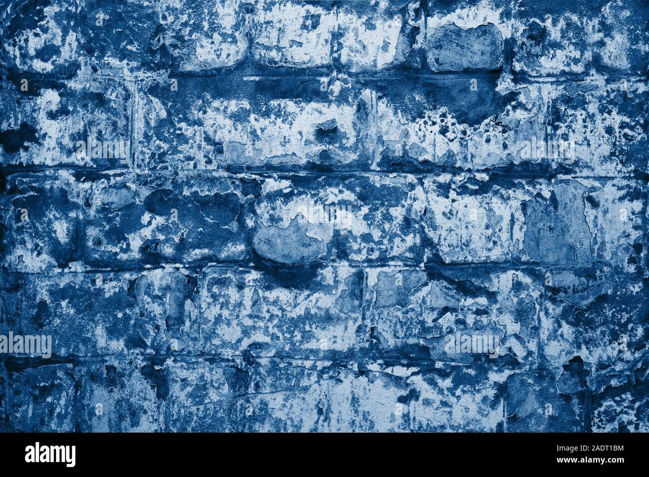 La texture della vecchia dipinte di blu un muro di mattoni. Foto Stock