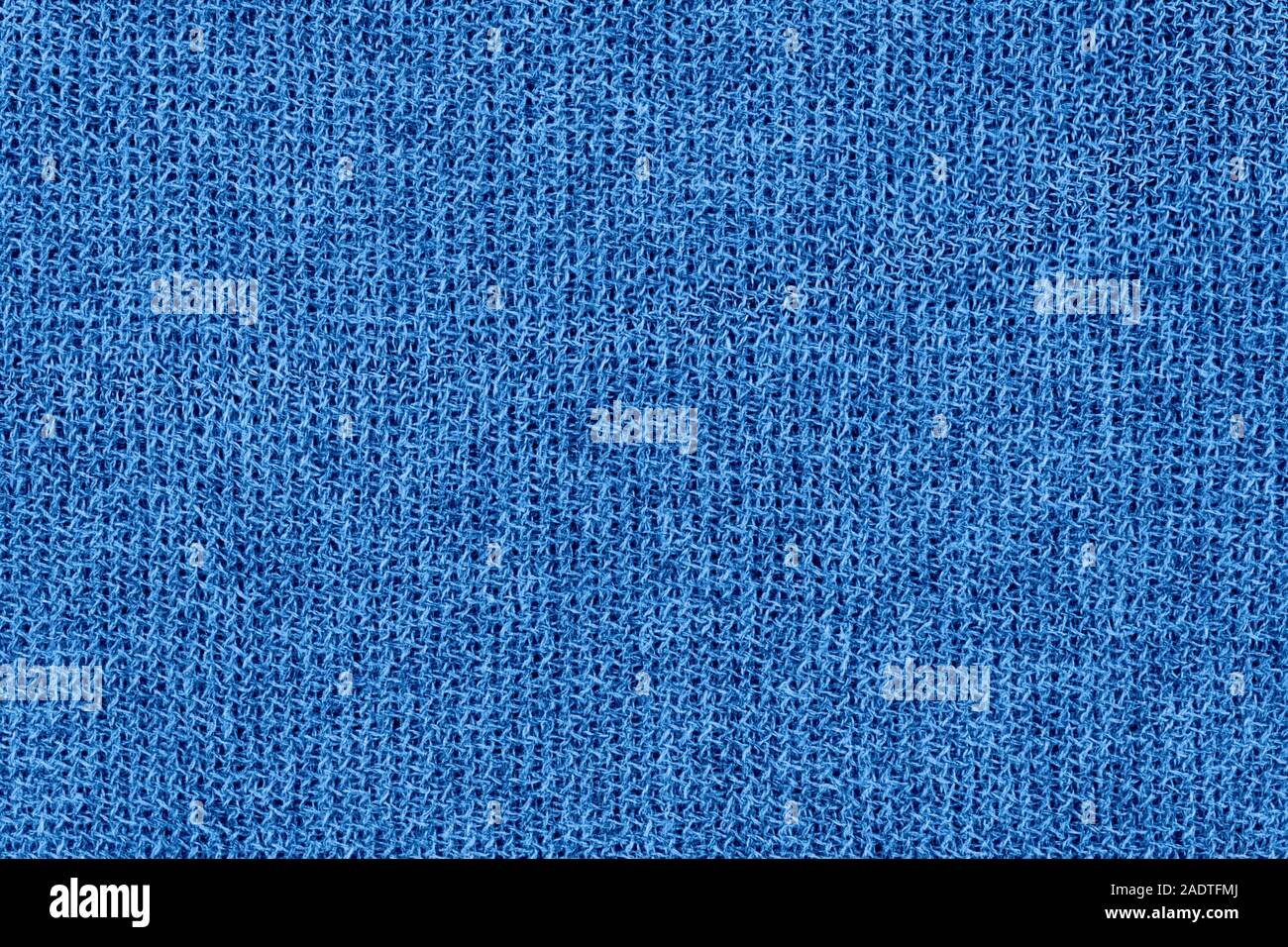 Abstract a maglia blu sullo sfondo. Tessuto di lana di texture. Foto Stock