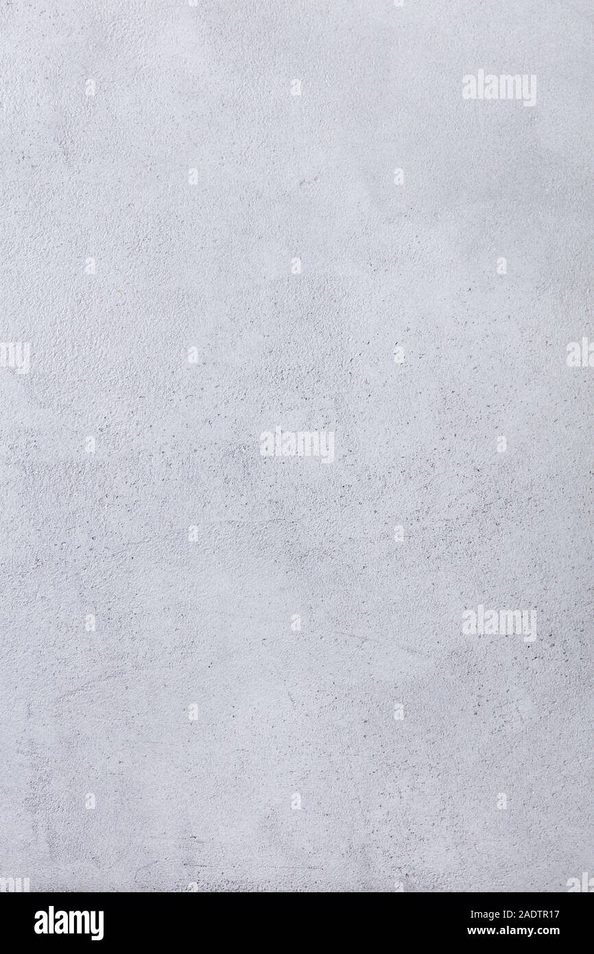 Pietra grigia sullo sfondo di calcestruzzo. Vista dall'alto. Spazio di copia Foto Stock