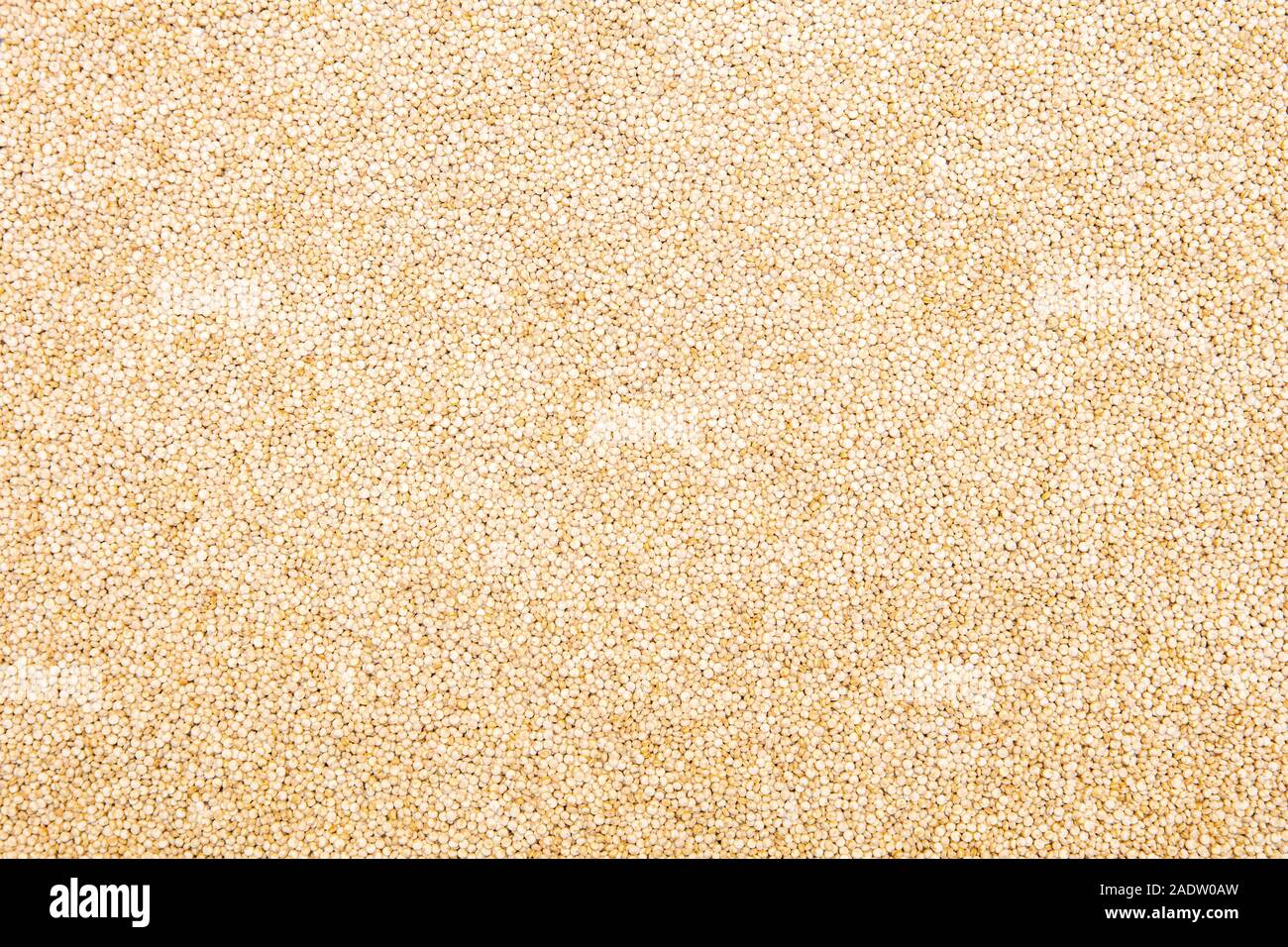Topview sfondo, non cotti e materie di quinoa semi di grano, Foto Stock