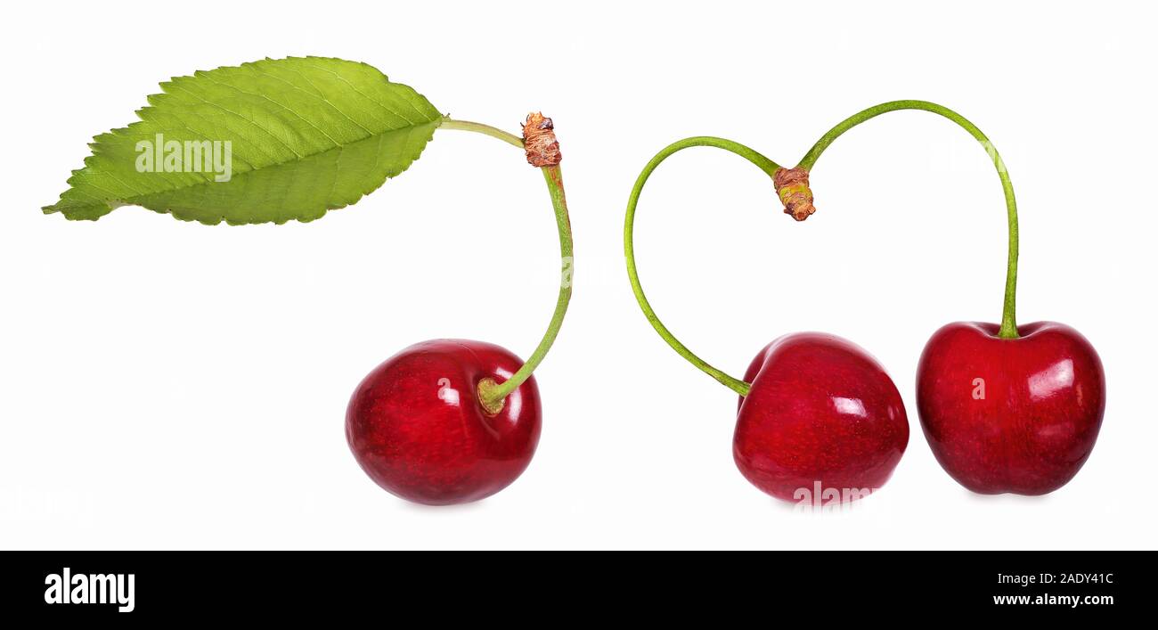 Croccante, ciliegie dolci con il simbolo del cuore Foto Stock