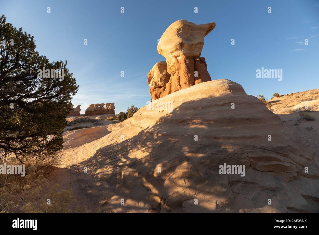 Giardino del Diavolo rocce in tarda giornata sole in grande scala Escalante National Monument in Utah. Foto Stock