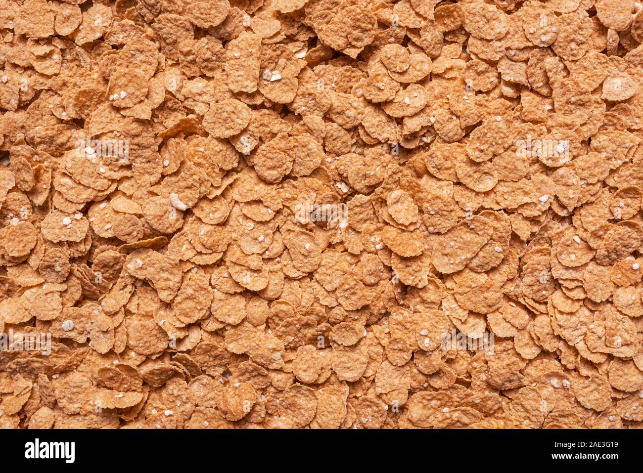 Fiocchi di avena heap, vista dall'alto. Mangiare sano texture pattern visto da sopra, pieno di sfondo del telaio Foto Stock
