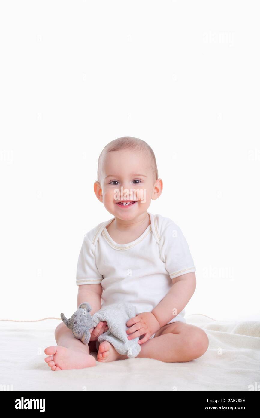 Ritratto di sweet little baby boy - isolato su bianco Foto Stock