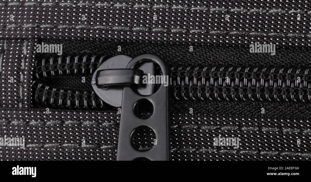 Borsa nera con puntini bianchi Foto Stock