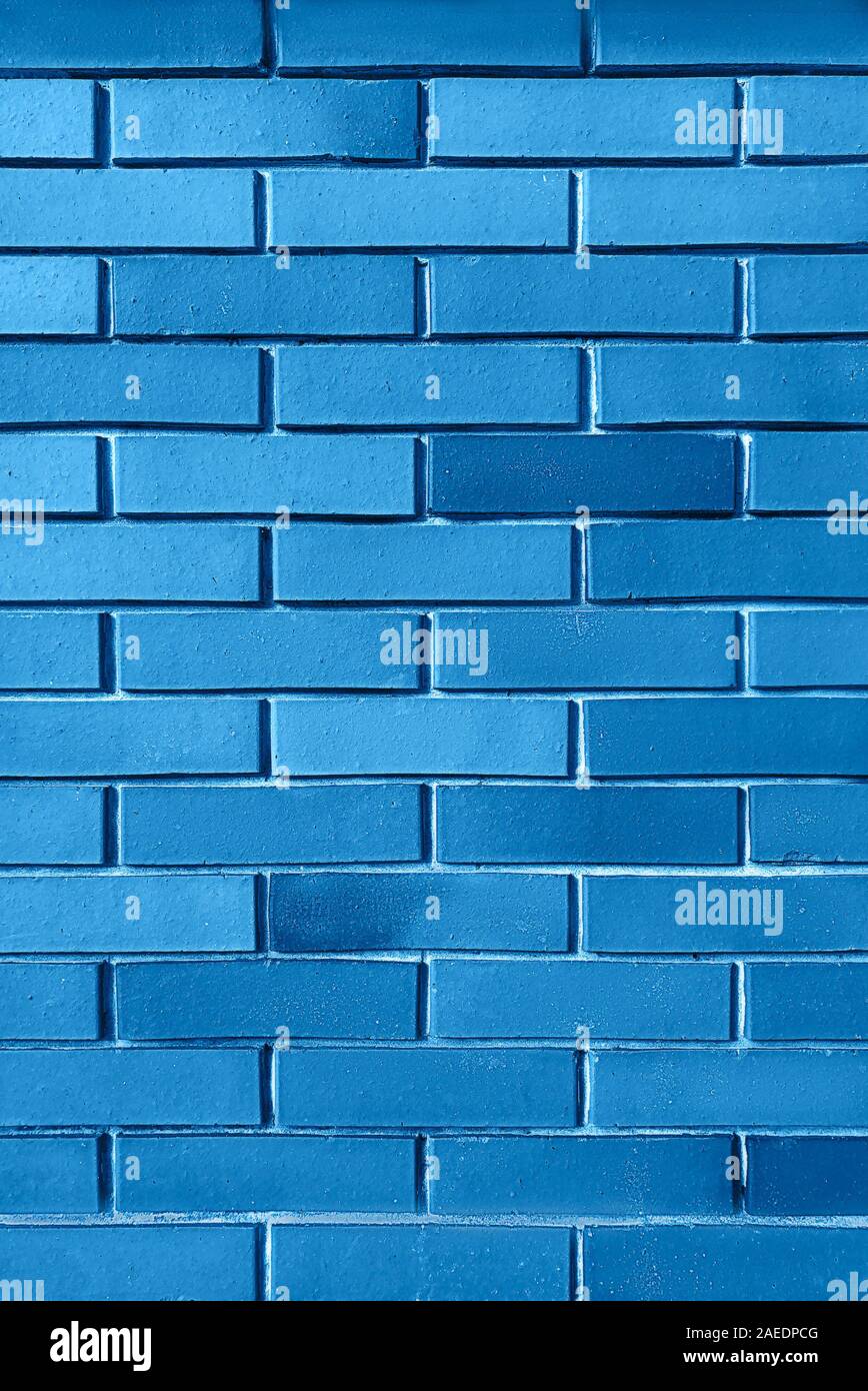 Sfondo blu dal muro di mattoni texture pattern, Wallpaper Design modello. Classic colore blu è il colore del 2020. Foto Stock
