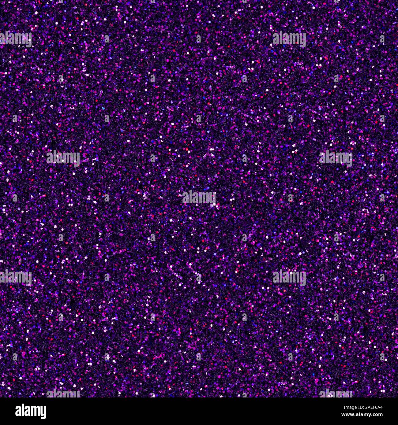 Olografica viola, porpora, fucsia, magenta glitter, sparkle coriandoli texture. Foto Stock