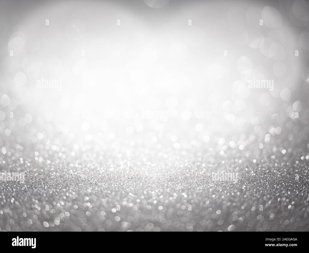 Glitter grigio lucido nel cuore di sfondo - il giorno di San Valentino concetto Foto Stock