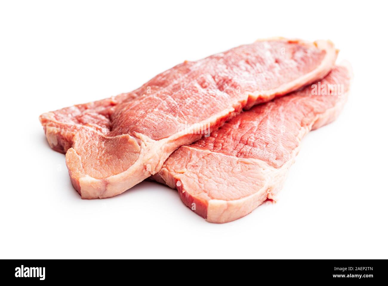 Raw cotoletta di vitello. Carne cruda isolati su sfondo bianco. Foto Stock