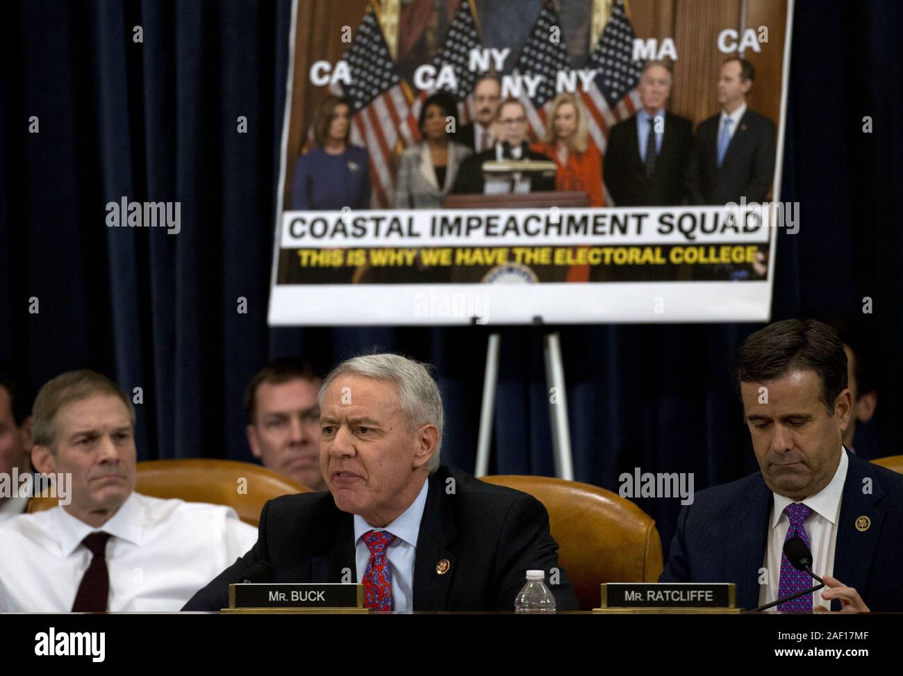 Washington, Distretto di Columbia, Stati Uniti d'America. Undicesimo Dec, 2019. Rappresentante degli Stati Uniti Ken Buck (Repubblicano del Colorado) parla durante una casa Comitato Giudiziario markup degli articoli di impeachment contro il presidente Donald Trump, sulla Capitol Hill Mercoledì, Dicembre 11, 2019, a Washington. A sinistra è il rappresentante USA Jim Jordan (repubblicano di Ohio) e a destra è il rappresentante statunitense John Ratcliffe (Repubblicano del Texas) Credito: Jose Luis Magana/CNP/ZUMA filo/Alamy Live News Foto Stock