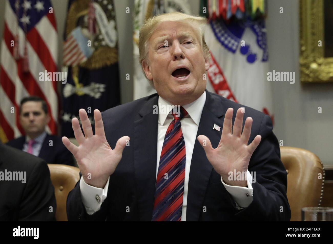 Washington, Stati Uniti. 12 Dic, 2019. Stati Uniti Presidente Donald Trump parla ai media durante un briefing sul traffico di droga sul confine sud della casa bianca a Washington il 13 marzo 2019. Foto di Yuri Gripas/UPI Credito: UPI/Alamy Live News Foto Stock