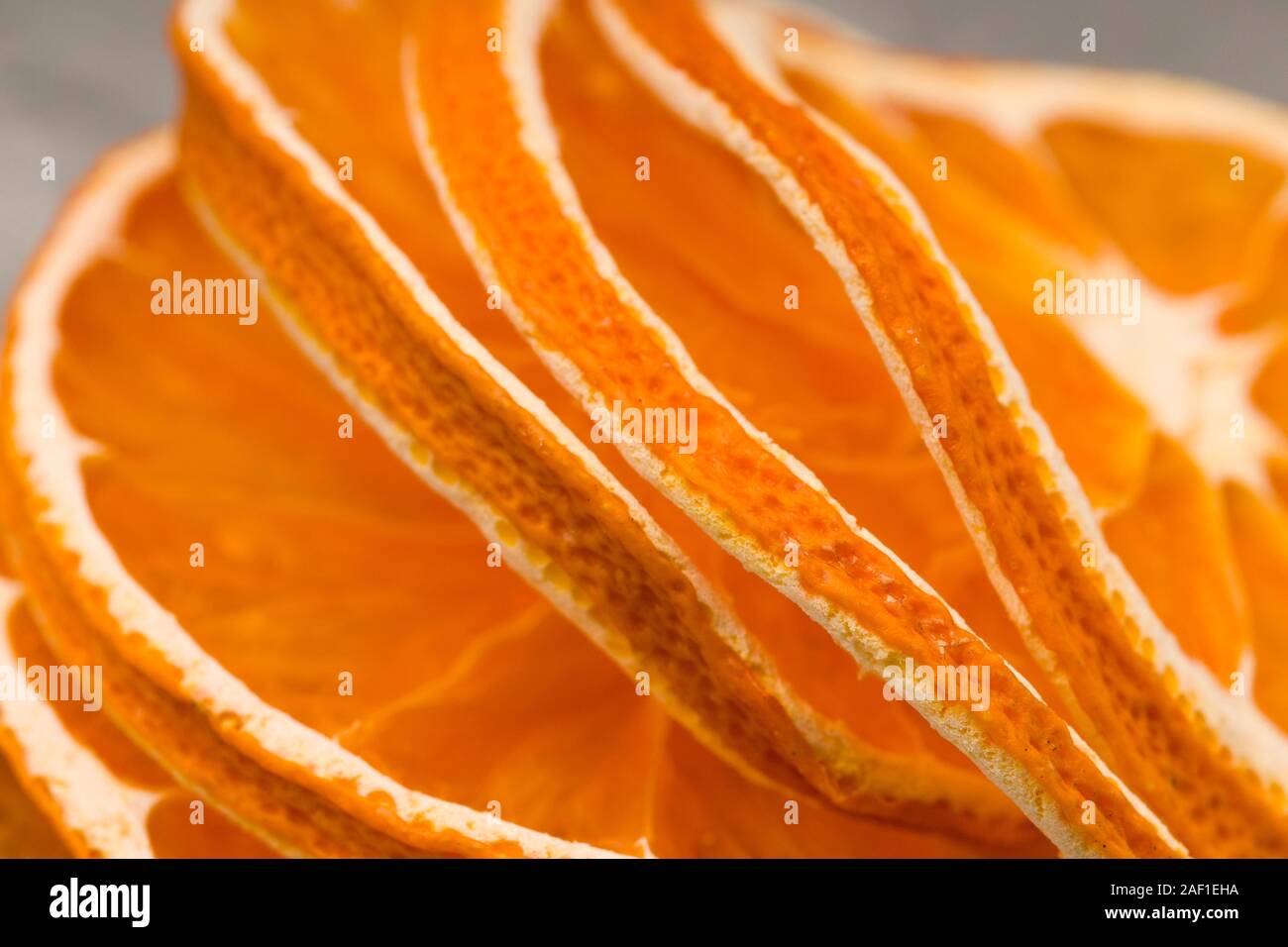 Succosa sfondo da arancio brillante. Asciugare le arance come sfondo Foto Stock