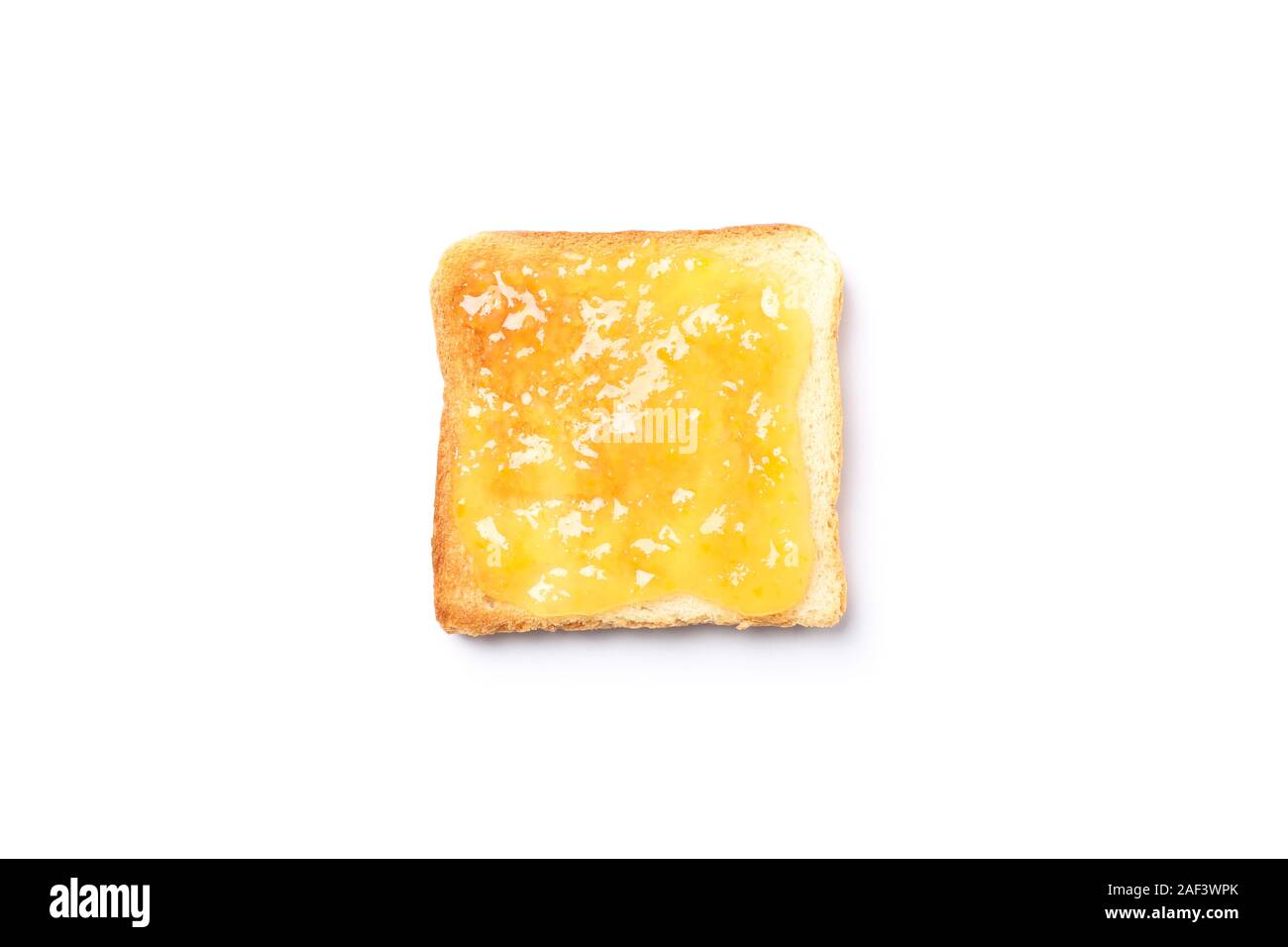 Toast con marmellata di arancio isolato su sfondo bianco Foto Stock