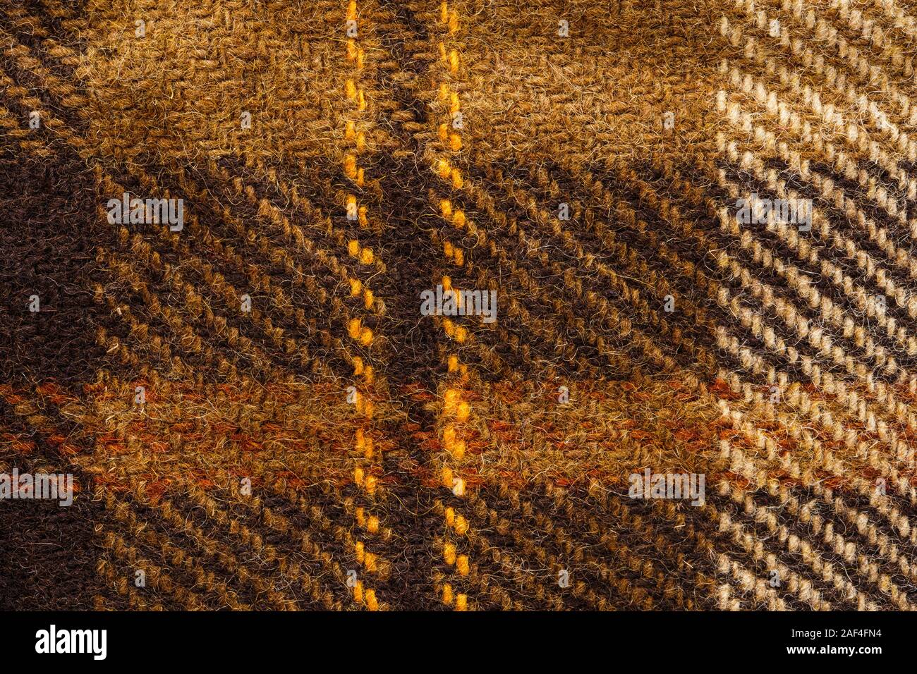 Controllare marrone tessuto. Lana scozzese. Tessuto per rivestire i plaid tuta. Close-up. Sfondo Foto Stock
