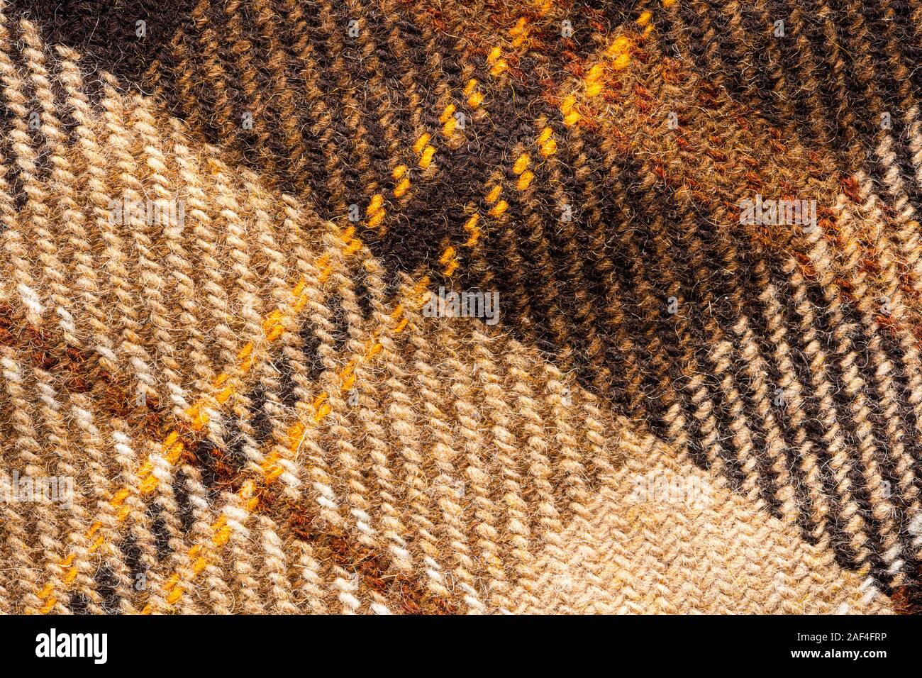 Controllare marrone tessuto. Lana scozzese. Tessuto per rivestire i plaid tuta. Close-up. Sfondo Foto Stock