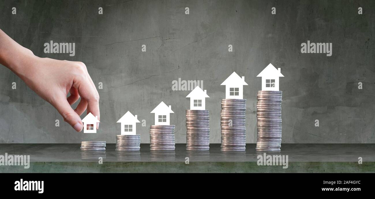 Le coltivazioni di salvataggio di monete - Concetti di investimento e di beni immobili di interesse di crescita Foto Stock