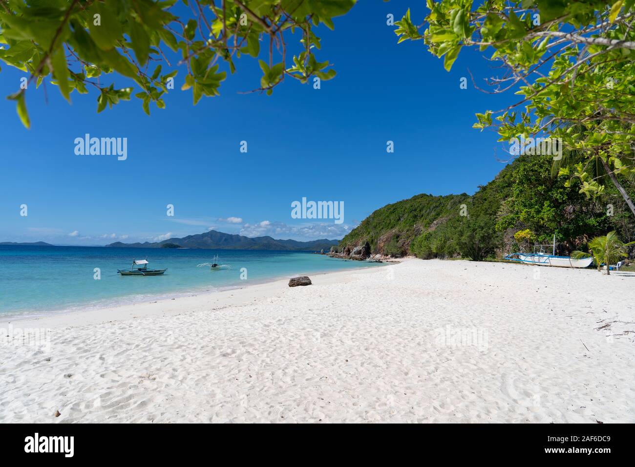 La mattina presto immagine di Malcapuya Isola con n. di persone,Coron,Filippine Foto Stock