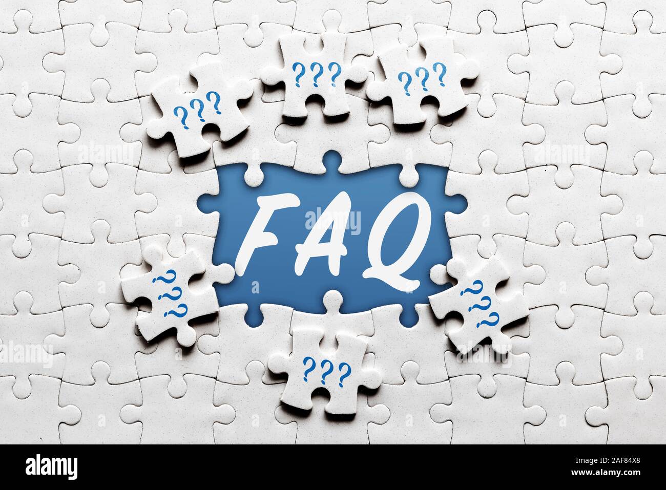 Domande frequenti Domande frequenti concetto con puzzle Foto Stock
