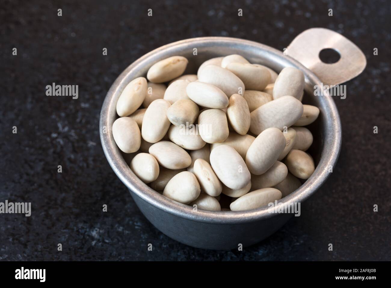 Non cotti Fagioli Cannellini Foto Stock