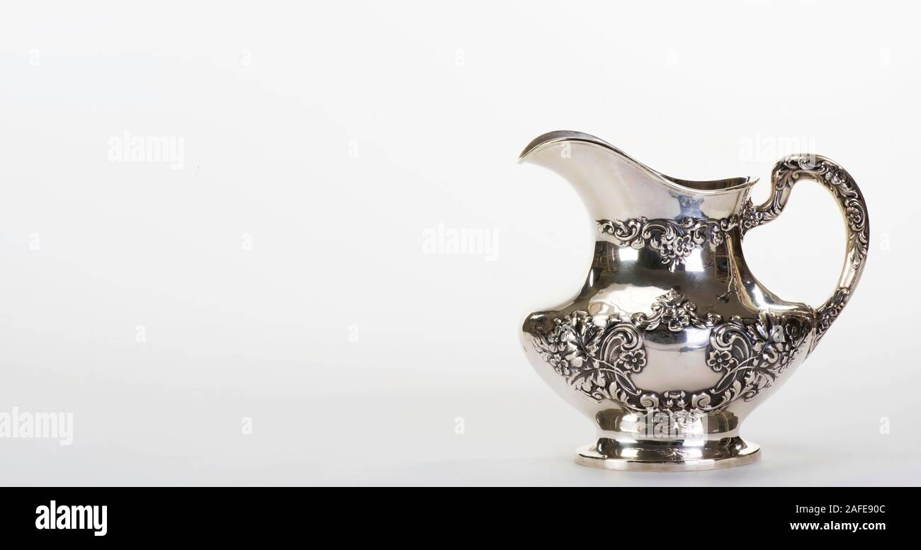 Antique sterling brocca con camera per il vostro tipo di messaggio o. Foto Stock
