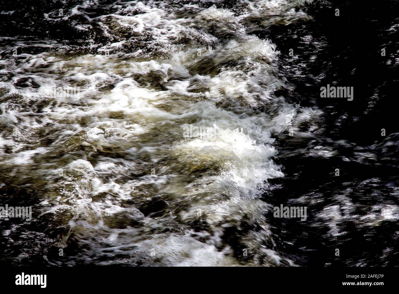 Acqua bianca in un fiume Foto Stock