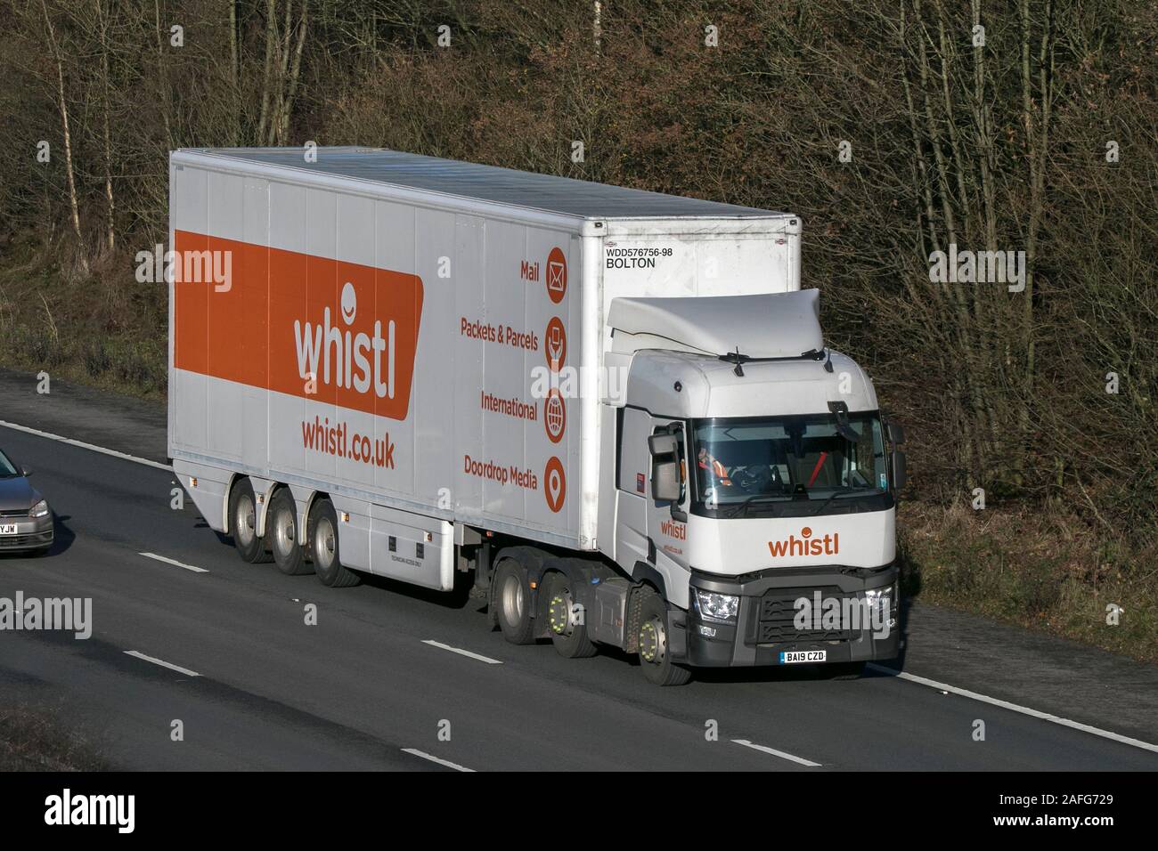 Whistl Haulage furgoni, camion, trasporto, carrello, operatore cargo, Renault veicolo commerciale, trasporti, industria, M6 a Lancaster, Regno Unito Foto Stock
